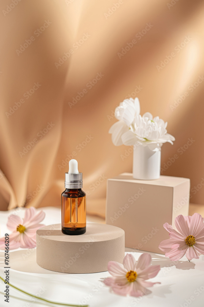 A bottle of essential oil sitting on top of a table A bottle of essential oil sitting on top of a table