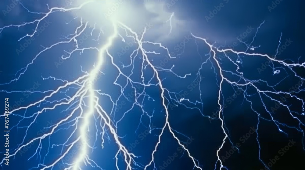 a close up of a lightning bolt on a dark blue sky with a bright lightening bolt in the middle of the picture. a close up of a lightning bolt on a dark blue sky with a bright lightening bolt in the middle of the picture.