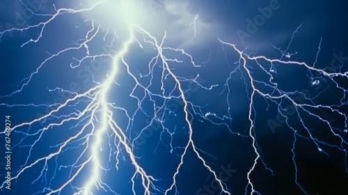  a close up of a lightning bolt on a dark blue sky with a bright lightening bolt in the middle of the picture.
