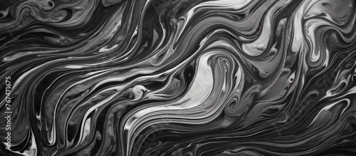 A monochrome photograph captures the intricate patterns of a marble texture in shades of brown and grey, creating a visual art piece with liquidlike symmetry