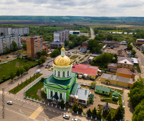Scenic aerial view of Holy Trinity Church in Russian town of Ozyory in summer day.. photo
