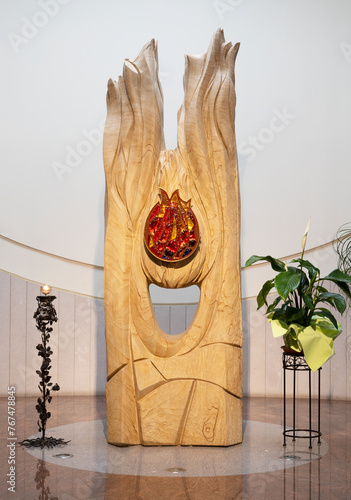 BARI, ITALY - MARCH 5, 2022: The modern stone tabernacle in the church Chiesa di Santa Croce from 20. cent.