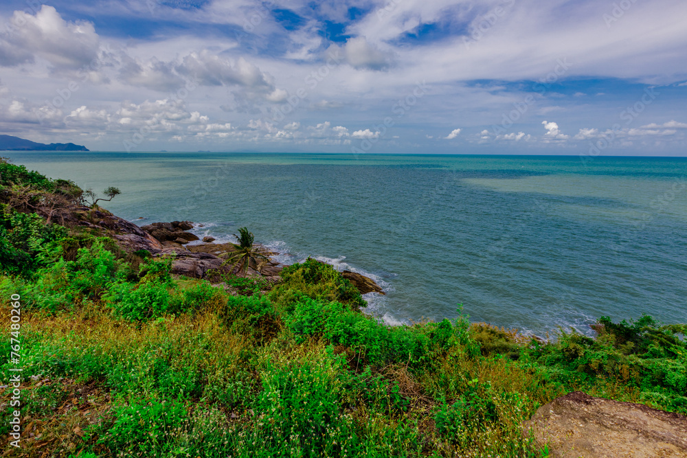  the background of the natural attractions of Khanom Sea, Ao Talet Wooden Bridgelk, you can walk out to admire the beautiful panoramic view of the sea. The sea has a bright blue color in the summer.