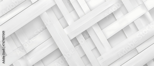 This image features an abstract pattern composed of overlapping and intersecting white lines and shapes on a white background. photo