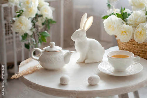 easter tea table decoration, porcelain rabbit, teapot, cups, generated with AI 