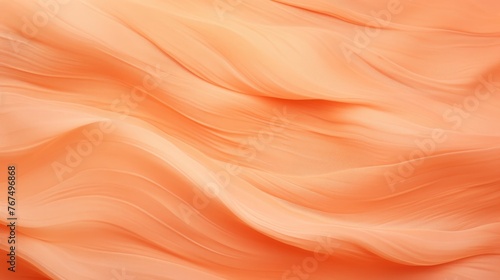 Background blurred texture to overlay onto images in your favorite editing program with specific blending modes. Texture color pastel orange paper crinkle.