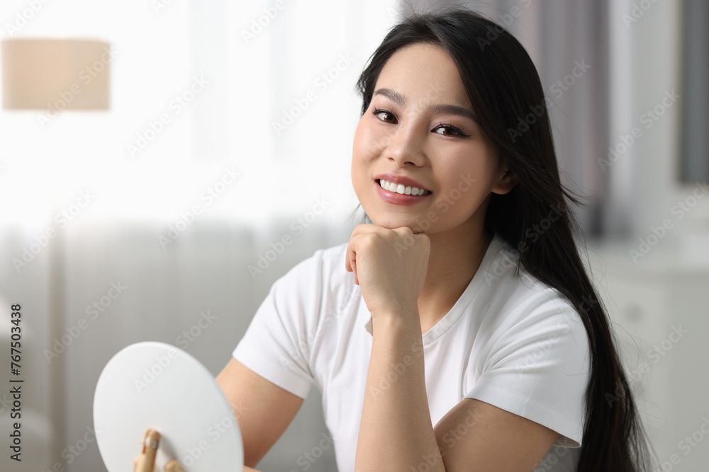 Portrait of beautiful woman with perfect skin at home, space for text Portrait of beautiful woman with perfect skin at home, space for text