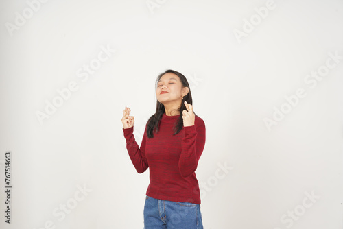 Young Asian woman in Red t-shirt crossing finger, Lucky finger isolated on white background