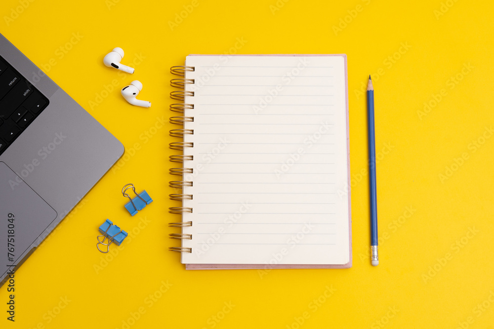 Study mood and notebook with wish list to do list on yellow background, flat lay style. Planning concept. Study mood and notebook with wish list to do list on yellow background, flat lay style. Planning concept.