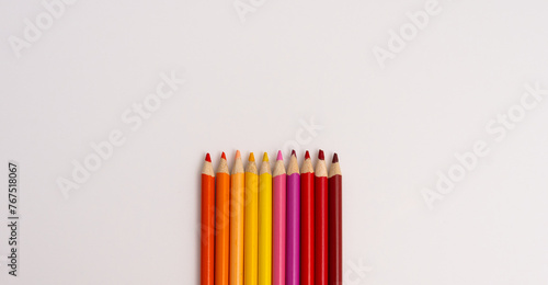 Colorful pencils isolated on white background. Close up. (ID: 767518067)