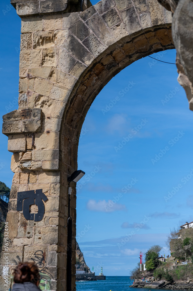 custom made wallpaper toronto digitalArch of Santa Ana in the fishing and tourist town of Pasaia in the Province of Guipúzcoa in March 2024.