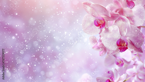 Orchid flowers with glitter bokeh background. Copy space. 