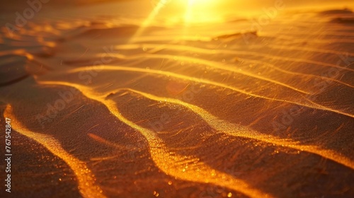 The sunlight beats down fiercely on the scorched sand causing it to shimmer and dance in the oppressive heat. photo