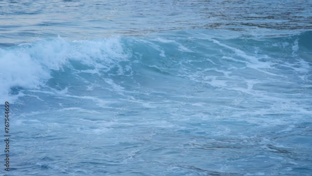 Close up of a breaking wave in slow motion Close up of a breaking wave in slow motion