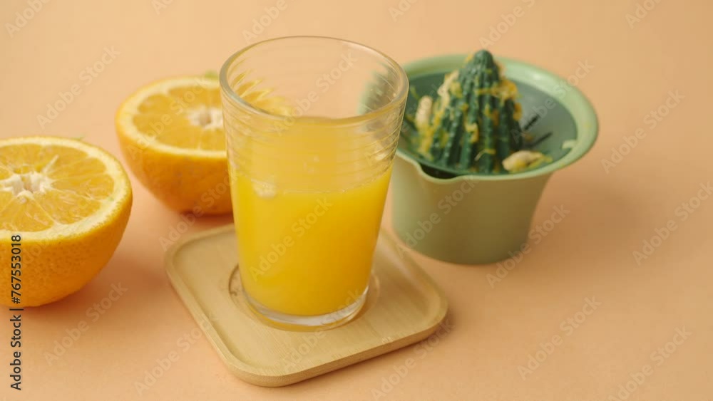 squeezing oranges into orange juice, squeezing oranges into orange juice,