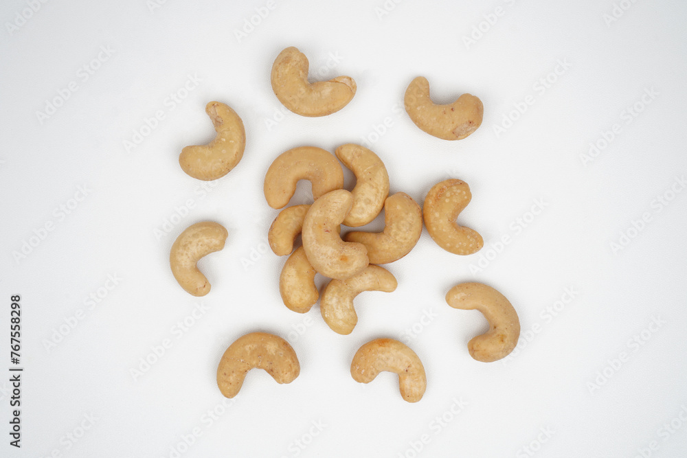 Top view of beautiful arrangement of roasted cashew nuts Isolated Background Top view of beautiful arrangement of roasted cashew nuts Isolated Background