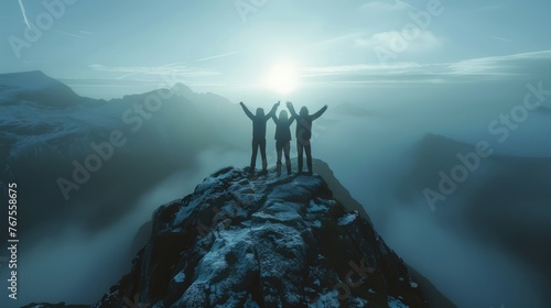 Together overcoming obstacles with three people holding hands up in the air on mountain top , celebrating success and achievements