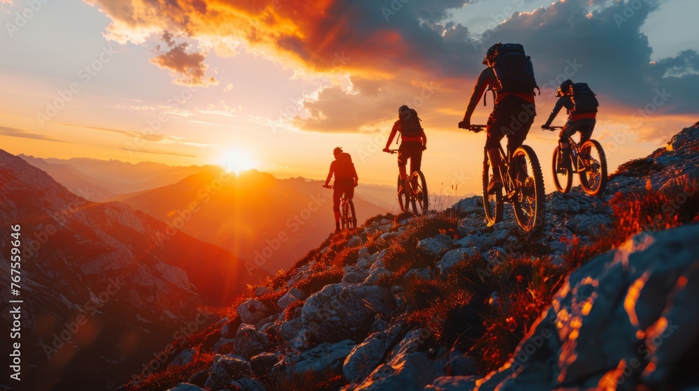 Fototapeta premium A line of dirt bikes Tours the mountain landscape at sunset