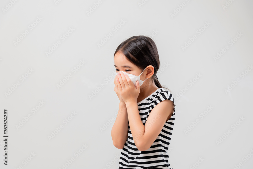 Coronavirus Covid-19.Little asian kid girl wearing face mask Happy at home. Coronavirus Covid-19.Little asian kid girl wearing face mask Happy at home.