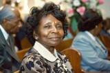 Old photo of an elderly black woman sitting at a church