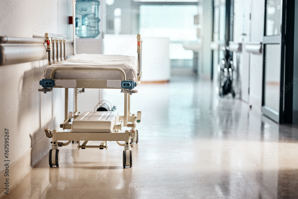 Ward, hospital and bed in a lobby, healthcare or wellness with furniture or interior with help or risk. Hallway, clinic or emergency service with surgery or medical center with bacteria or facility