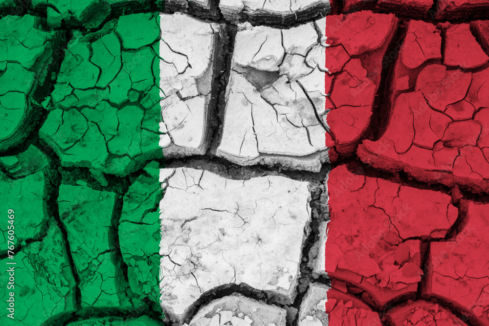 Dry soil pattern on the flag of Italy. Country with drought concept due to climate change. Water problem. Dry cracked earth country.