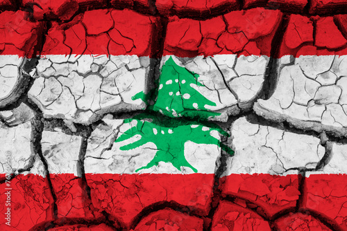 Dry soil pattern on the flag of Lebanon. Country with drought concept due to climate change. Water problem. Dry cracked earth country.