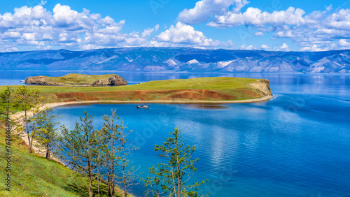 View from Olkhon island to Maloe More or Small Sea of lake Baikal and Kharantsy cape and bay. Picturesque summer landscape, beautiful natural background. Discovering distant places of Earth. Siberia