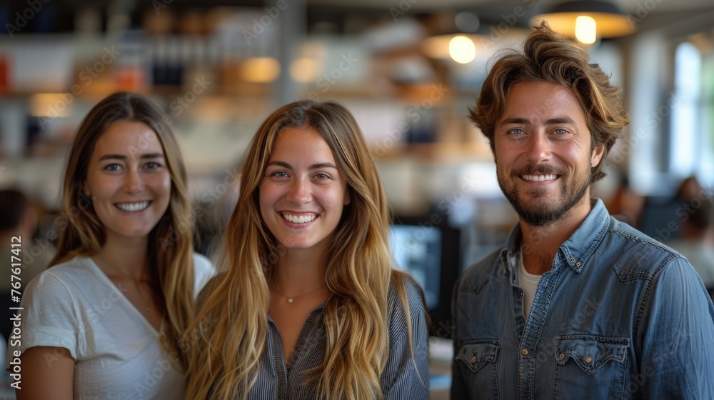 Group of three friends smiling together in a cafe. Group of three friends smiling together in a cafe.