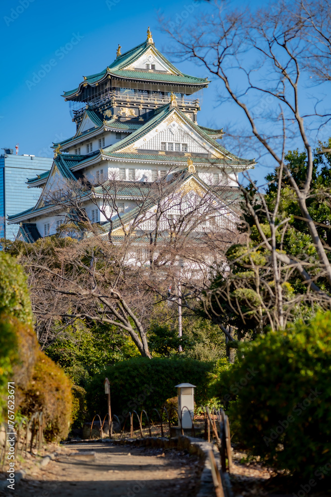 Landscape view Osaka's landmark Osaka Castle castle tower that shines in the blue sky, Osaka Japan. Landscape view Osaka's landmark Osaka Castle castle tower that shines in the blue sky, Osaka Japan.