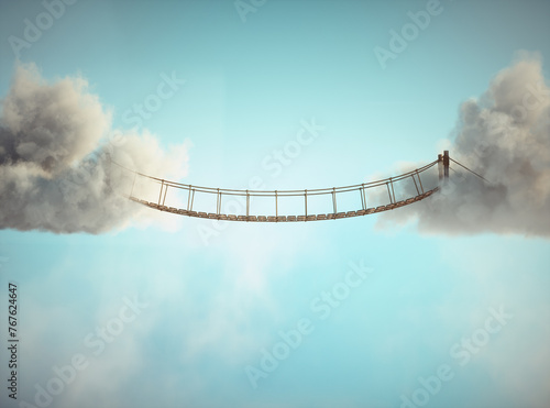 Surreal image of a rope bridge connecting two clouds.