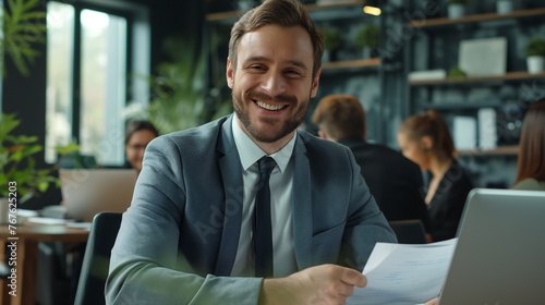 The power of creativity and innovation: businessman in an office setting. The happy man found an area to apply his professionalism. The profession brings success, money and pleasure