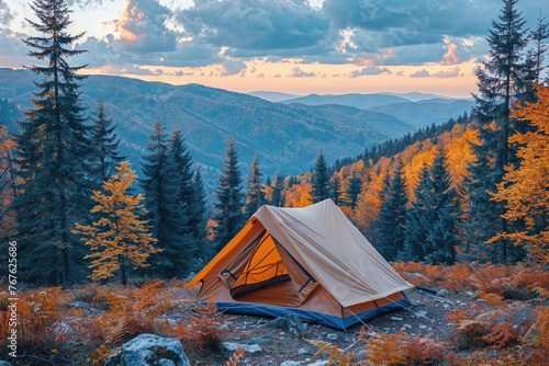 A small tent is set up in a forest with a view of mountains