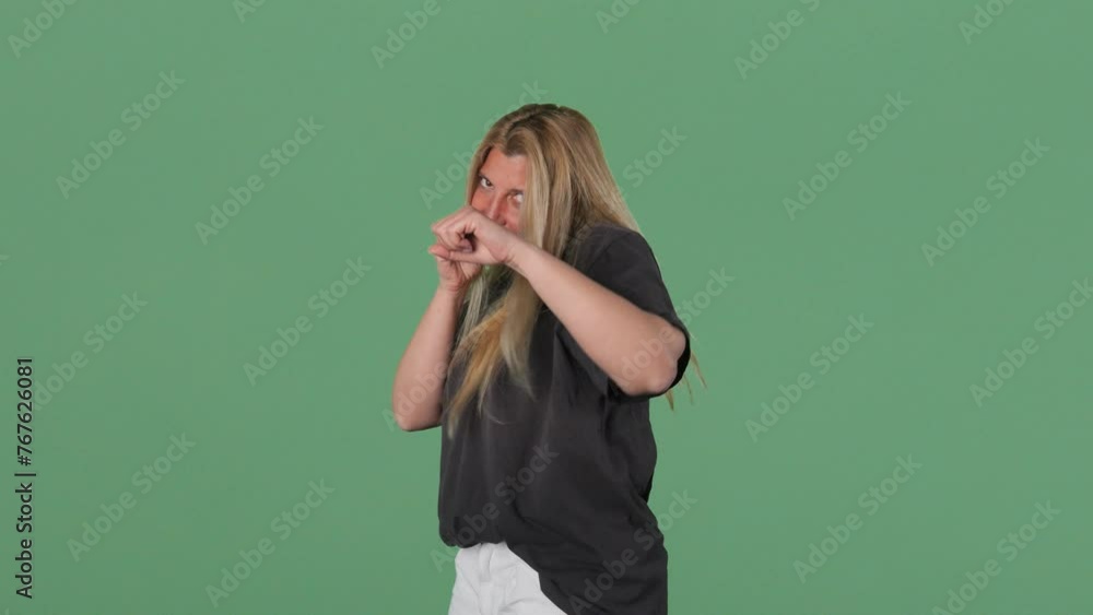 Blonde Woman Shadow Boxing Towards Camera Green Screen Background Fighter Intro Blonde Woman Shadow Boxing Towards Camera Green Screen Background Fighter Intro