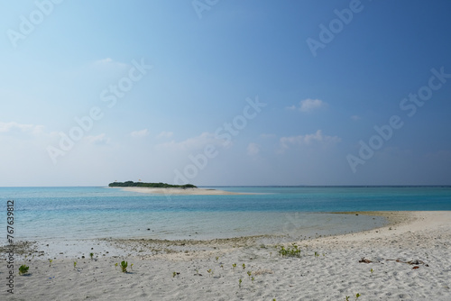 Mathiveri is one of the westernmost islands in the Maldives  beautiful beach scene with crystal clear blue water.