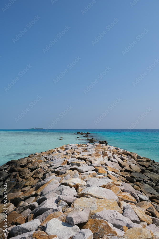 Mathiveri is one of the westernmost islands in the Maldives, beautiful beach scene with crystal clear blue water.