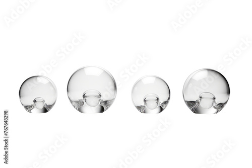 Trio of Glass Spheres in Harmony. On White or PNG Transparent Background.