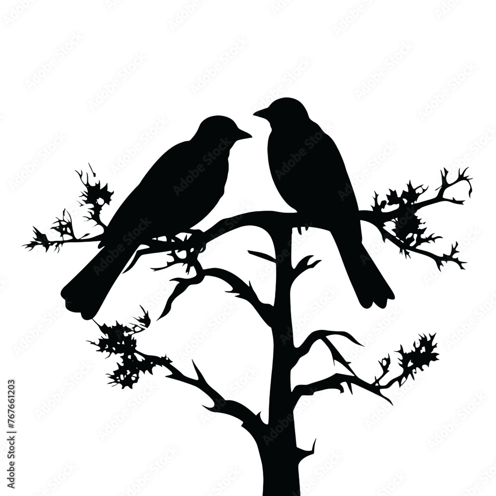 A bird sitting on top of a tree branch A bird sitting on top of a tree branch