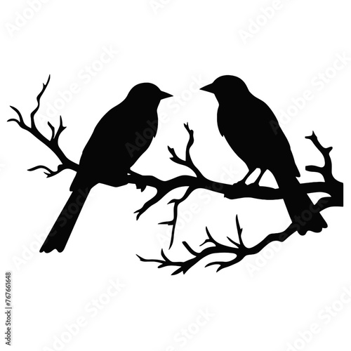 A birds sitting on top of a tree branch