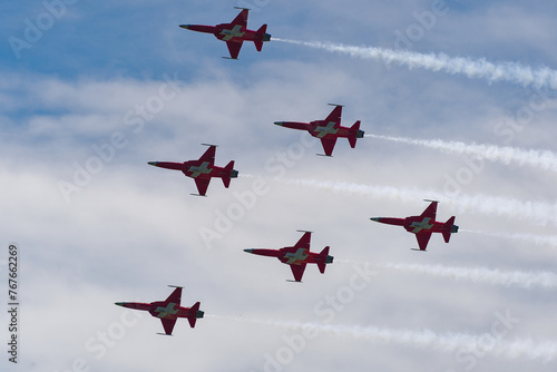 Patrouille Suisse doing aerobatics at Swiss Army exhibition at training ground of Swiss City of Kloten on a sunny summer day. Photo taken August 18th, 2023, Zurich Kloten, Switzerland.
