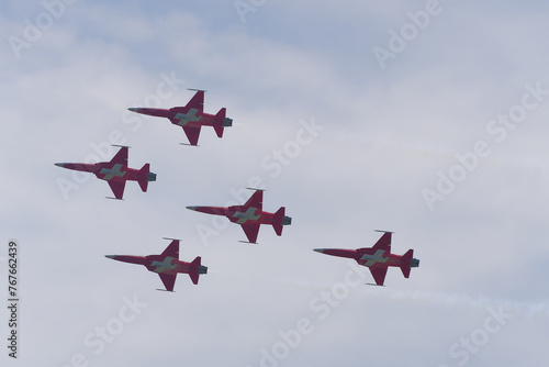 Patrouille Suisse doing aerobatics at Swiss Army exhibition at shooting range of Swiss City of Bülach on a sunny summer day. Photo taken August 18th, 2023, Bülach, Canton Zürich, Switzerland. photo