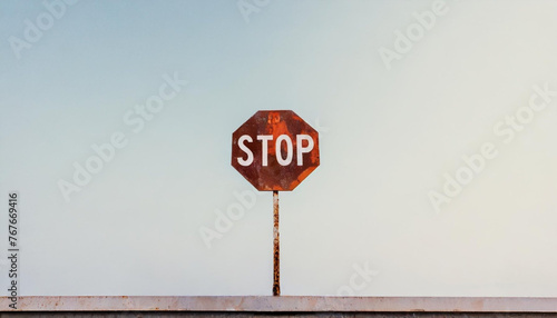 Rusted red traffic STOP sign © Aarón