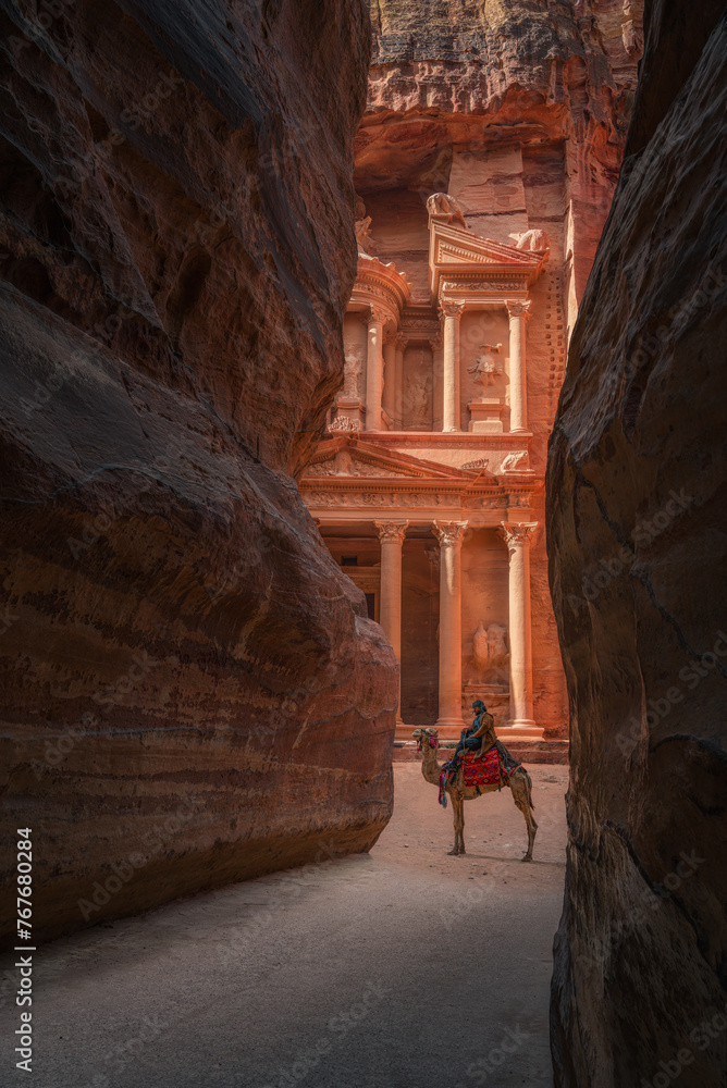 Al Khazneh (The Treasury) in Petra with Bedouin and Camel at Dawn