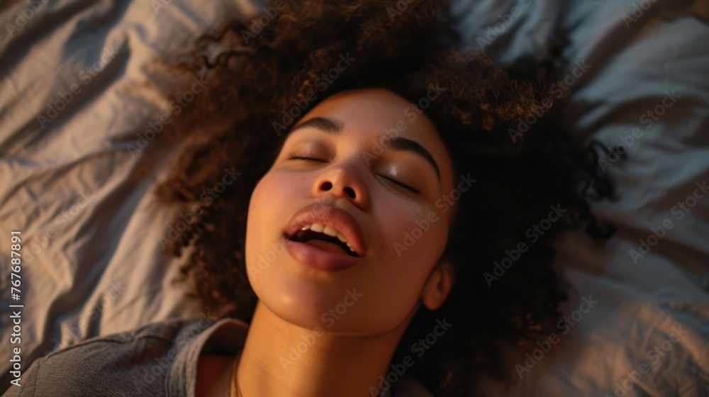 High Angle View Of A Young Woman In Bed Getting Orgasm High Angle View Of A Young Woman In Bed Getting Orgasm