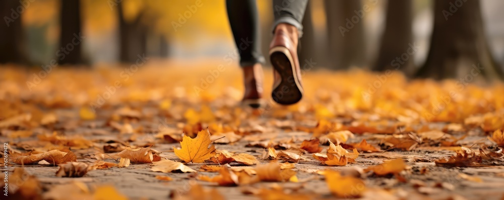 Warm autumn woman's walking motion is captured among fallen leave Warm autumn woman's walking motion is captured among fallen leave