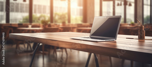 Wallpaper Mural Cozy Workspace Setup with Laptop in Sunlit Cafe Torontodigital.ca