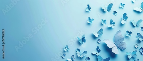 A blue background with many butterflies flying around. The butterflies are in various sizes and are scattered throughout the image