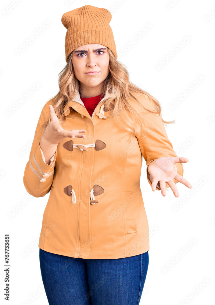 Young caucasian woman wearing casual clothes clueless and confused expression with arms and hands raised. doubt concept. Young caucasian woman wearing casual clothes clueless and confused expression with arms and hands raised. doubt concept.