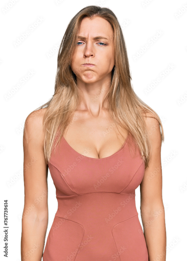 Beautiful caucasian woman wearing casual clothes puffing cheeks with funny face. mouth inflated with air, crazy expression. Beautiful caucasian woman wearing casual clothes puffing cheeks with funny face. mouth inflated with air, crazy expression.