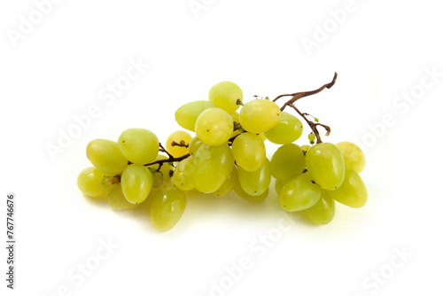 Bunch of organic green grapes isolated on white background.